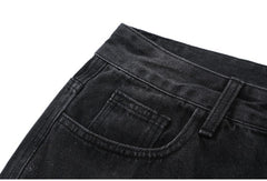 MIXED EMOTION Multi‑Patch Black Denim Jorts