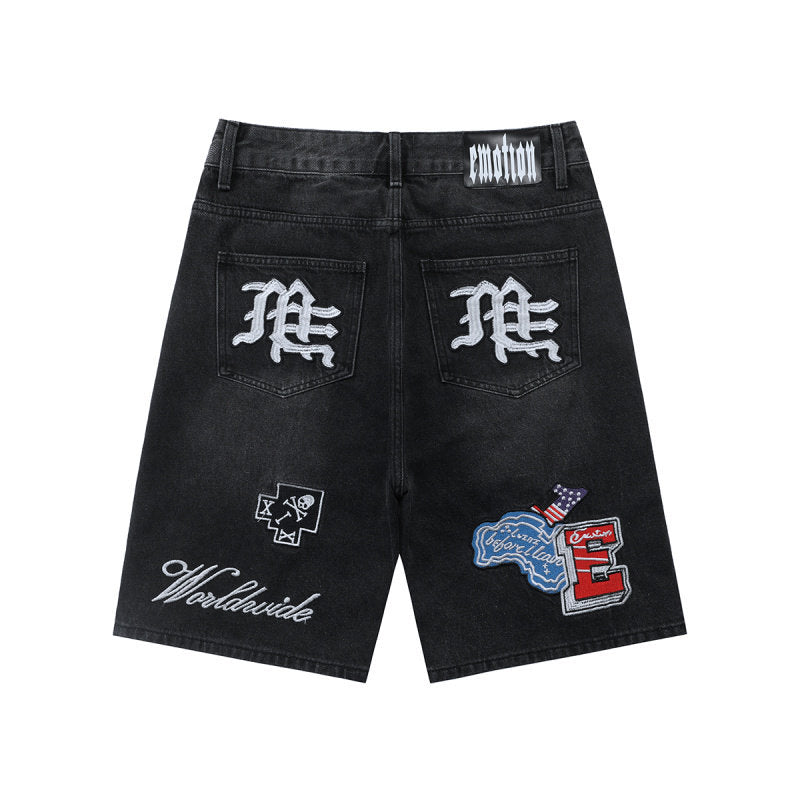 MIXED EMOTION Multi‑Patch Black Denim Jorts