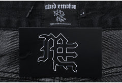 MIXED EMOTION Multi‑Patch Black Denim Jorts