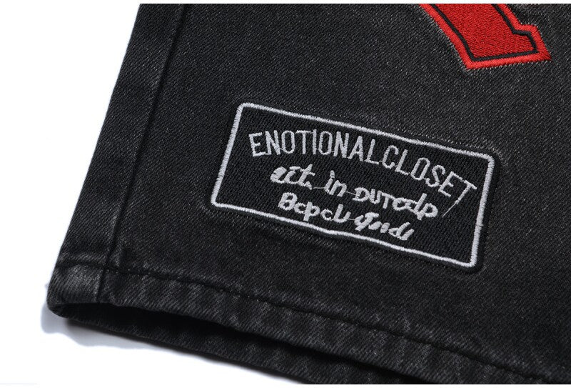 MIXED EMOTION Multi‑Patch Black Denim Jorts